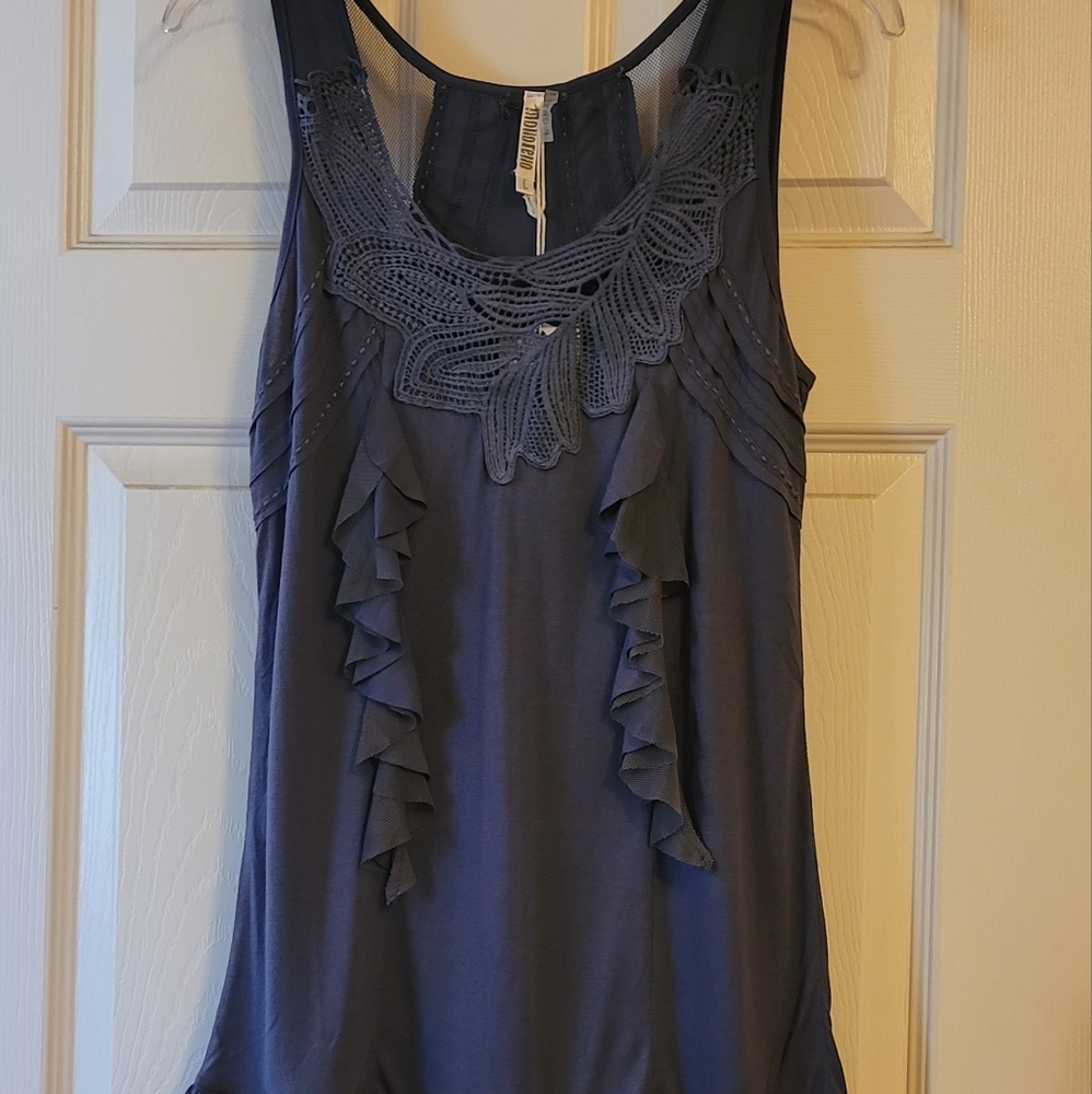 Gray short dress with ruffles & design in front.